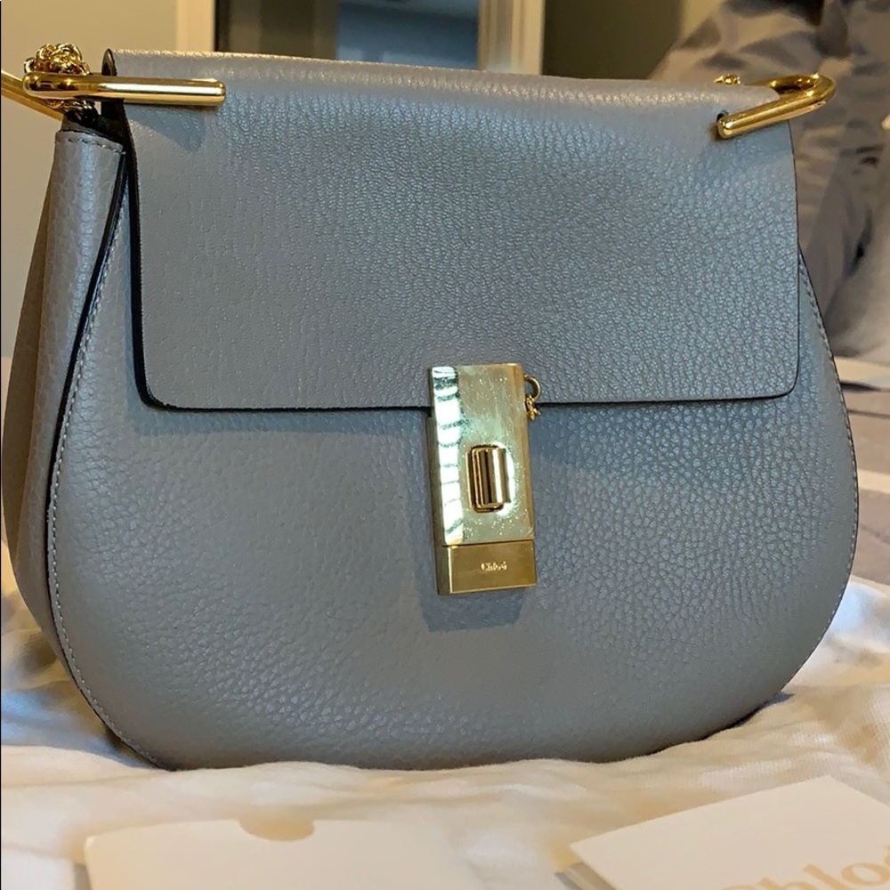 Chloe drew large in motty grey